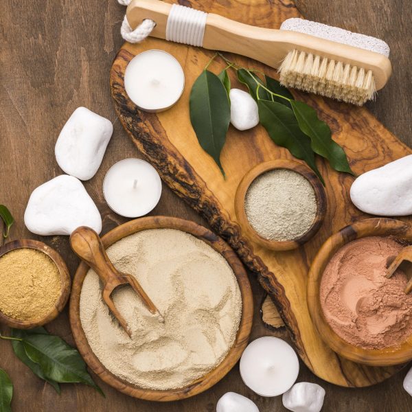 top-view-selection-fine-powders-bowls-with-scoops-stones